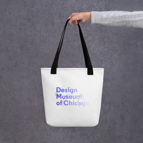 White tote bag with blue logo reading 